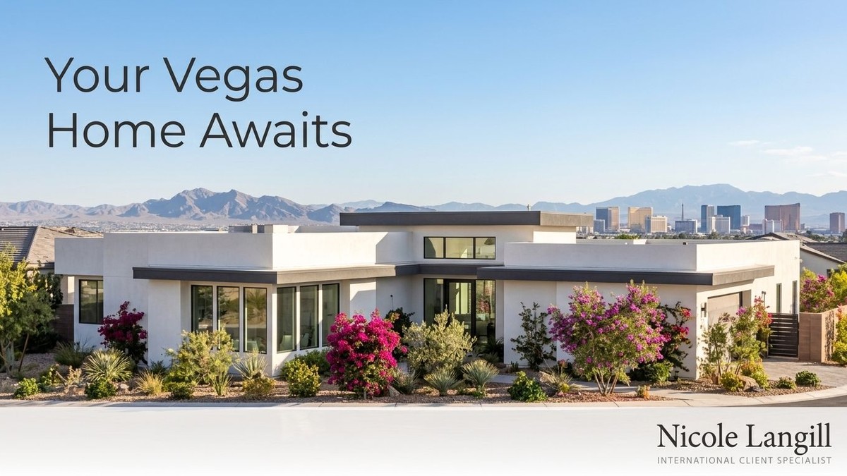 Modern white house with desert landscaping, mountains, and the Las Vegas skyline in the background.